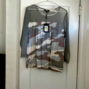 DKNY top it has mesh sleeves and collar sz Medium